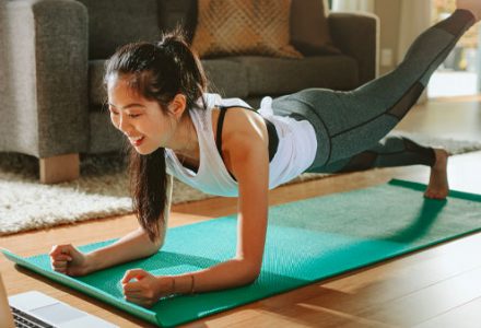 woman doing yoga at home